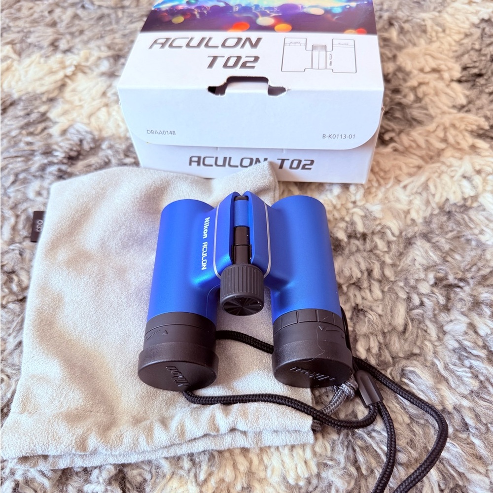- Lightweight Travel Optics Nikon ACULON T02 binoculars